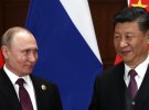 путін солодко дивиться на лідера Китаю