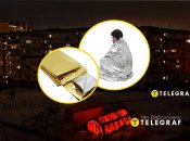 Відключення світла у Києві, чоловік у термоковдрі