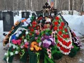 У росії поховали військового та його дитину