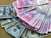 Гривня та долар