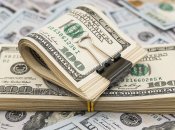 Долари в Україні часто підробляють