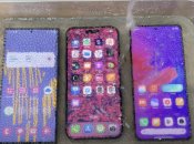 Лучшая "заморозка" для горячего лета: блогер залил смартфоны газировкой и поставил в холодильник (видео)