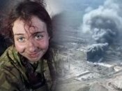 Молодая военная поет в подвале предприятия под бомбардировками россиян