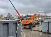 Работы в аварийной зоне не прекращаются даже в непогоду