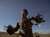 Украинский военный с дронами