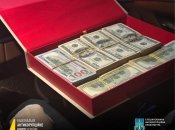 Деньги, полученные в результате преступной деятельности, в китайской шкатулке