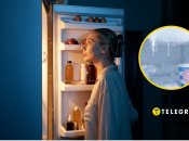 Женщина смотрит в холодильник