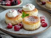 Сирники - це чудовий варіант сніданку та перекусу (зображення створено за допомогою ШІ)