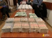 Мільйони доларів готівки та антикваріат: що НАБУ знайшла при обшуку у брата судді Вовка (фото)