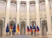 Олаф Шольц и владимирп путин