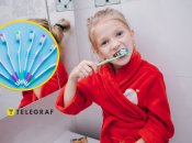 Дівчинка чистить зуби