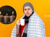 Свічки, чоловік з чашкою