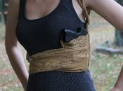 Представлена женская кобура для скрытого ношения оружия под облегающей одеждой (Видео)