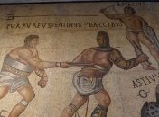 В Помпеях археологи нашли древнюю фреску с изображением боя гладиаторов