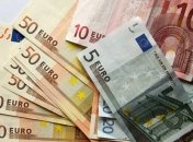 Евро дешевеет из-за Германии