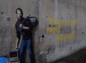 Бэнкси изобразил Стива Джобса в образе сирийского беженца