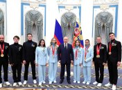Владимир Путин с российскими олимпийцами