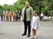 Борис Філатов з дівчинкою під час заходу