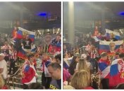 В Австралии сербы развернули флаг с изображением кровавого диктатора владимира путина