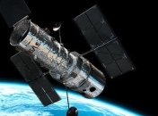 Телескоп Хаббл запечатлел две "воюющие" галактики