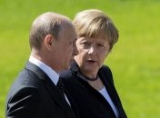 Путин и Меркель говорили о Сенцове