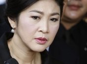 Осужденная за коррупцию экс-премьер Таиланда бежала в Лондон