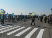 Активисты блокады Крыма сообщают, что их окружили правоохранители