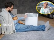 Мужчина у обогревателя