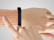 Браслет, который превратит вашу руку в тачскрин (Видео)