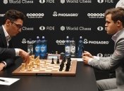 Шахматы. Карлсен и Каруана сыграли вничью в шестой партии матча за звание чемпиона мира