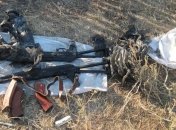 В заброшенном доме в Красногоровке обнаружили тайник с оружием и боеприпасами