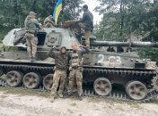 Украинские воины после успешной атаки