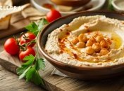 Хумус не только очень вкусен, но и полезен (изображение создано с помощью ИИ)