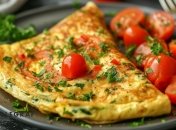 Омлет з томатами - це чудовий варіант сніданку та швидкого перекусу (зображення створено за допомогою ШІ)