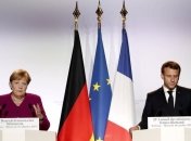 Макрон и Меркель приветствуют "позитивные сдвиги в осуществлении Минских соглашений"