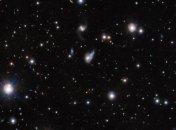 Астрономы получили снимок светового эха сливающихся галактик