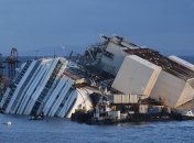 Операция по подъему Costa Concordia наконец-то началась (Фото) 