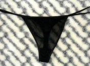 "Надуло ветром": в Киеве байкер прикрыл номера стрингами (фото)