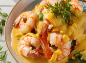 Сирний соус чудово підкреслює смак креветок  (зображення створено за допомогою ШІ)