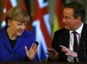 Кэмерон и Меркель: Путин должен действовать 