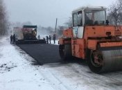 Платить не будем: Укравтодор прокомментировал укладку асфальта в снег