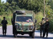 На месте падения самолета работают военные