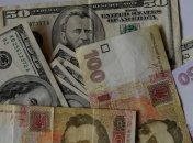 Курс гривны по итогам торгов на межбанке незначительно укрепился