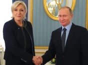 Мари Ле Пен на встерче со своим главным спонсором