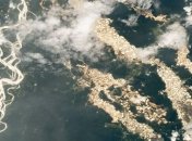 Потрясающе мрачно: с борта МКС сняли испещренный карьерами золотоискателей лес Амазонки (фото)