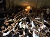 В храме Гроба Господня в Иерусалиме сошел Благодатный огонь: видео