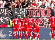 Футболисты и болельщики "Униона"