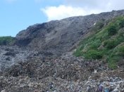  На Грибовичской свалке продолжаются поиски комунальщика