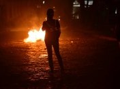 На улицах в центре Тбилиси – пламя, взрывы и стычки