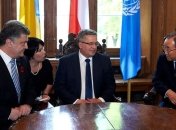 Порошенко обсудил ситуацию на Донбассе с Коморовским и Генсеком ООН 